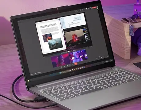 Notebook Gamer LOQe Gen 10 Ryzen 7 Lenovo 83S00001CL El notebook en un entorno de escritorio gamer, rodeado de accesorios, demostrando cómo se integra perfectamente en un ecosistema de juego profesional.